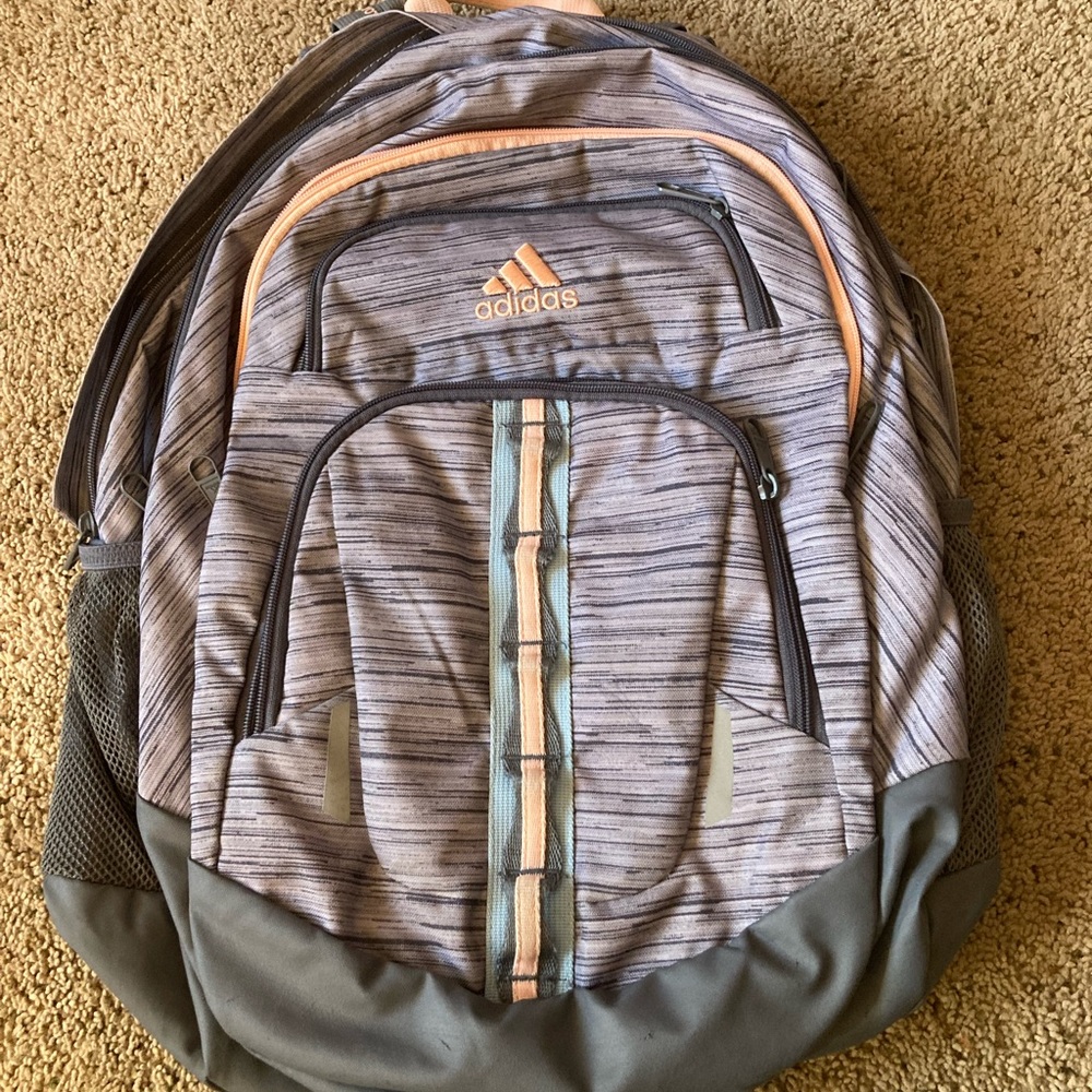 Multi-color, large capacity, ADIDAS backpack.